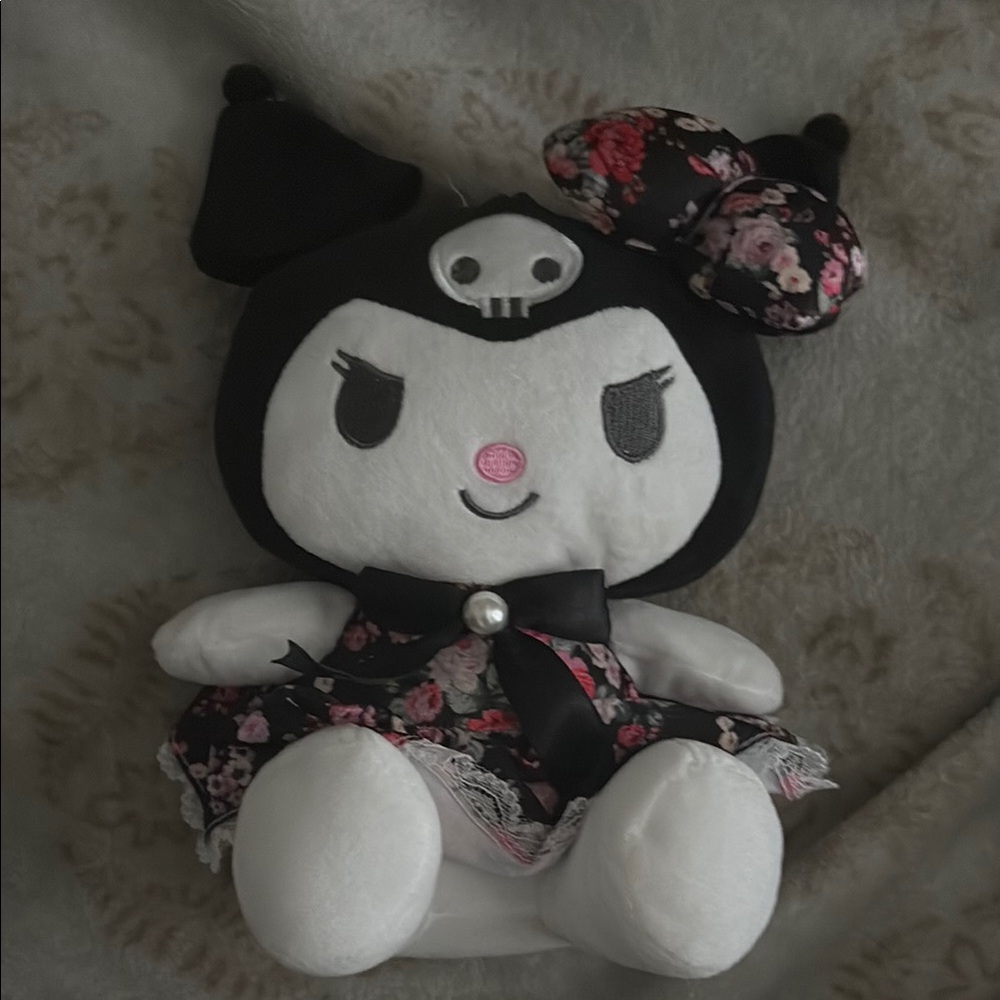 Cute Black and White Plush Toy with Floral Dress